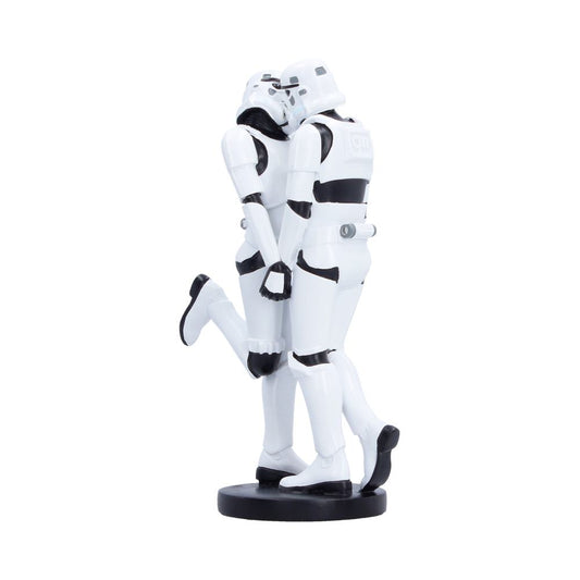 A Star Wars collectible figurine of two Stormtroopers embracing, standing on a round black base