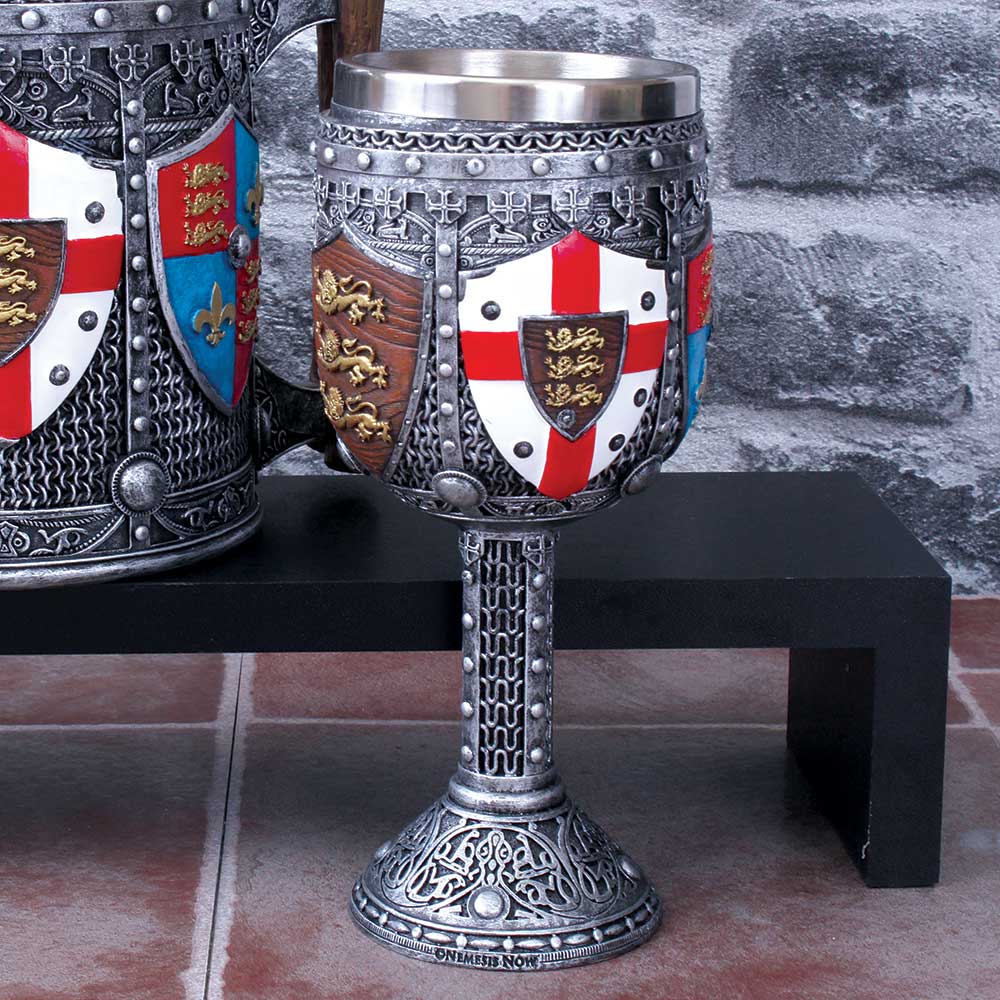 A resin goblet featuring heraldic designs, with a stainless steel insert for easy cleaning on display