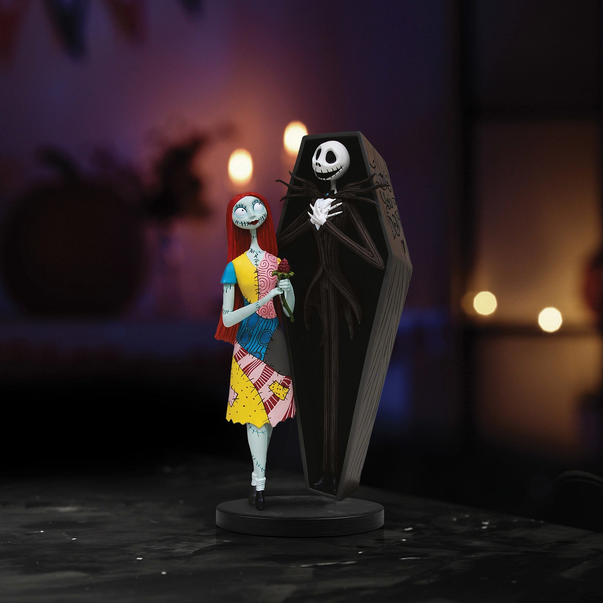 Jack Skellington and Sally Coffin Figurine 24cm by Disney Showcase showcasing the hand-painted characters, Gothic coffin design and detailed finish on display