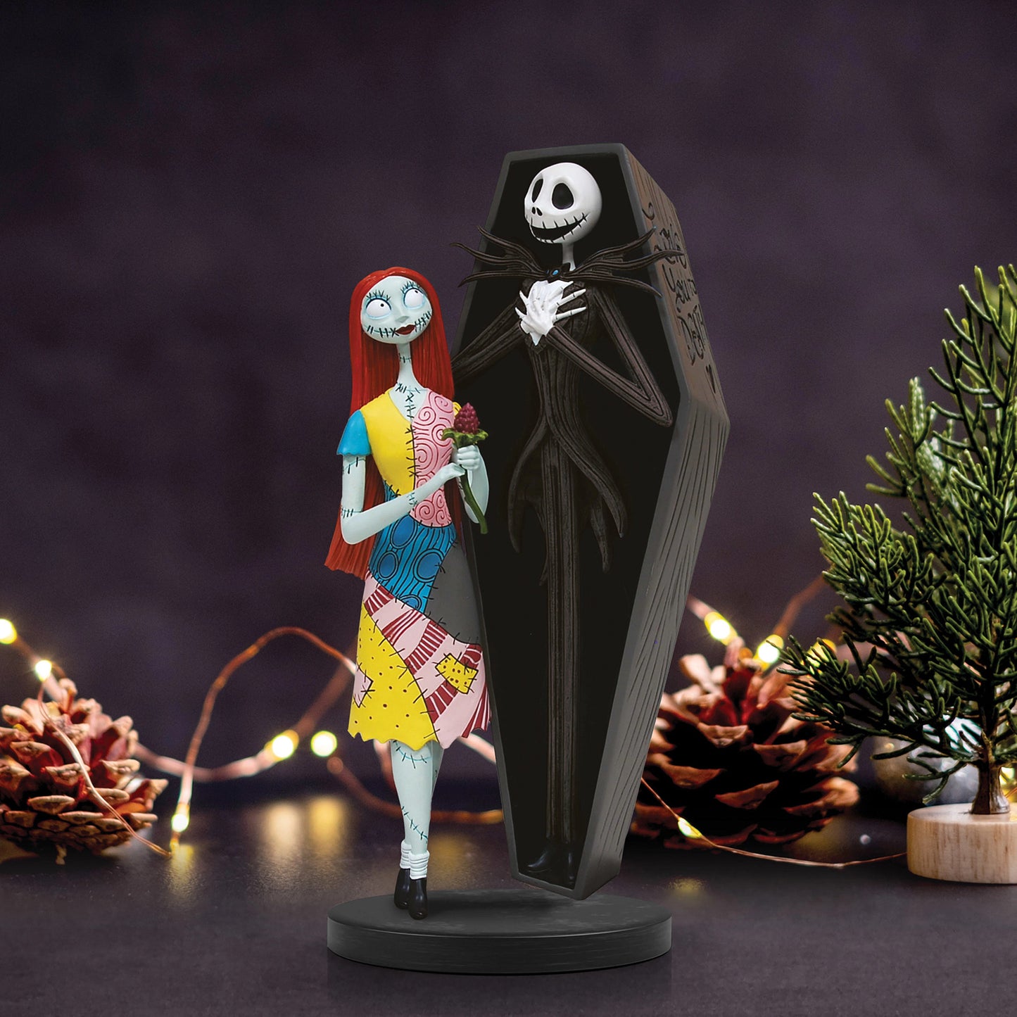 Jack Skellington and Sally Coffin Figurine showing the detailed cast stone finish and coffin-inspired design.