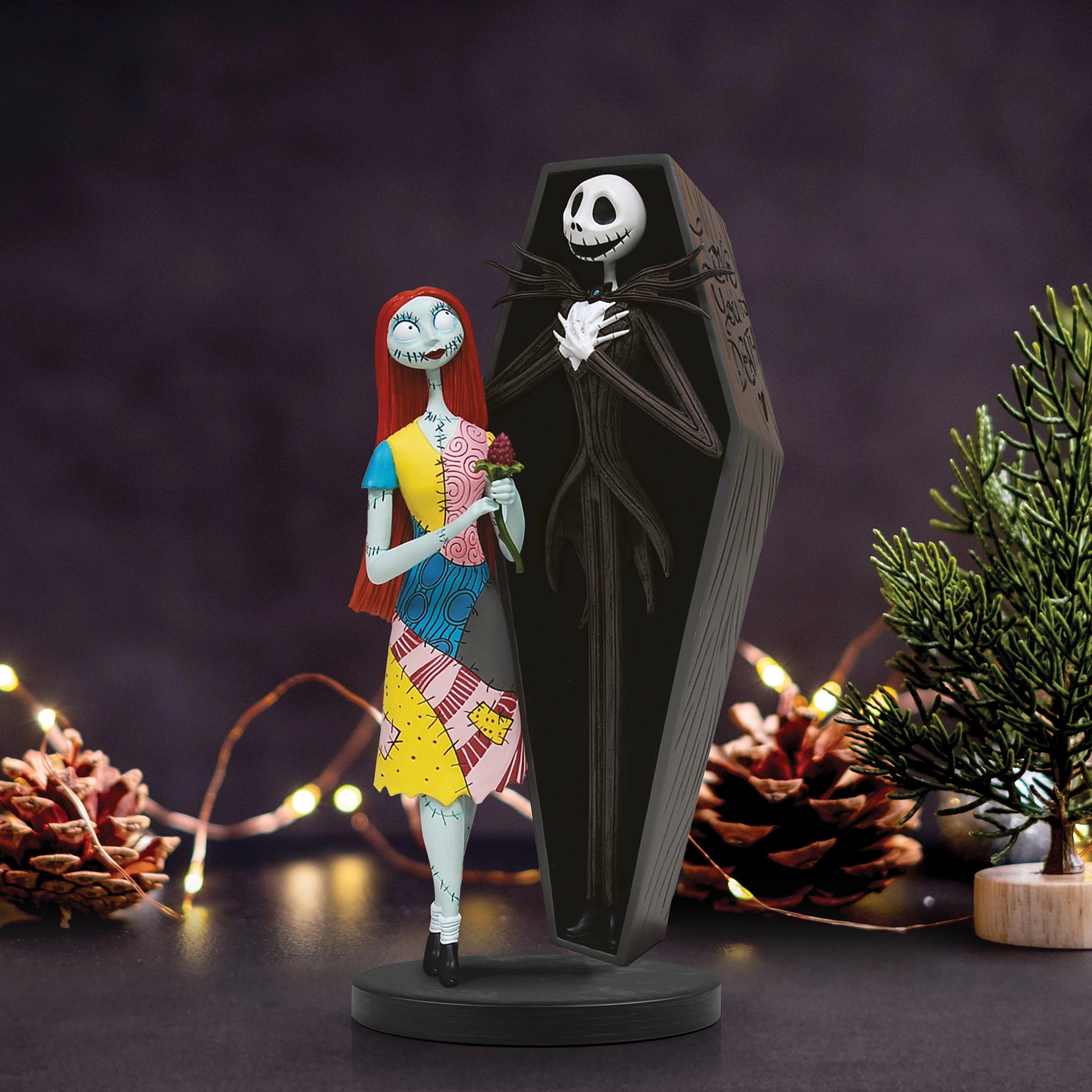 Jack Skellington and Sally Coffin Figurine showing the detailed cast stone finish and coffin-inspired design.