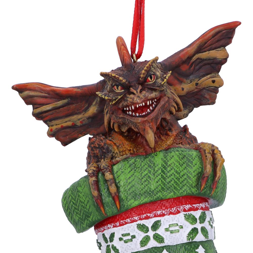 Mohawk Gremlin hanging from festive stocking