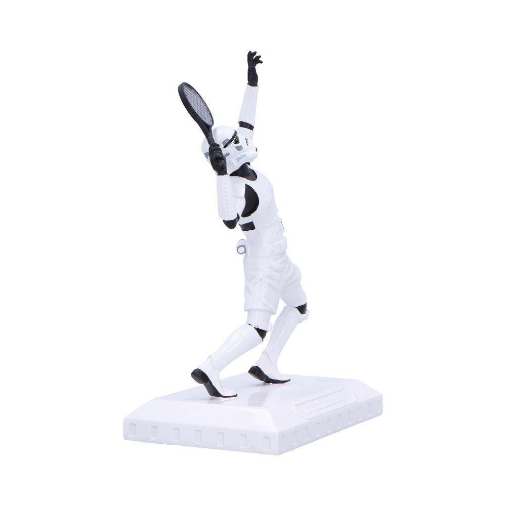 A resin figurine of a Stormtrooper from Star Wars in a tennis serving pose, dressed in white with black accents, holding a tennis racket, mounted on a white base.