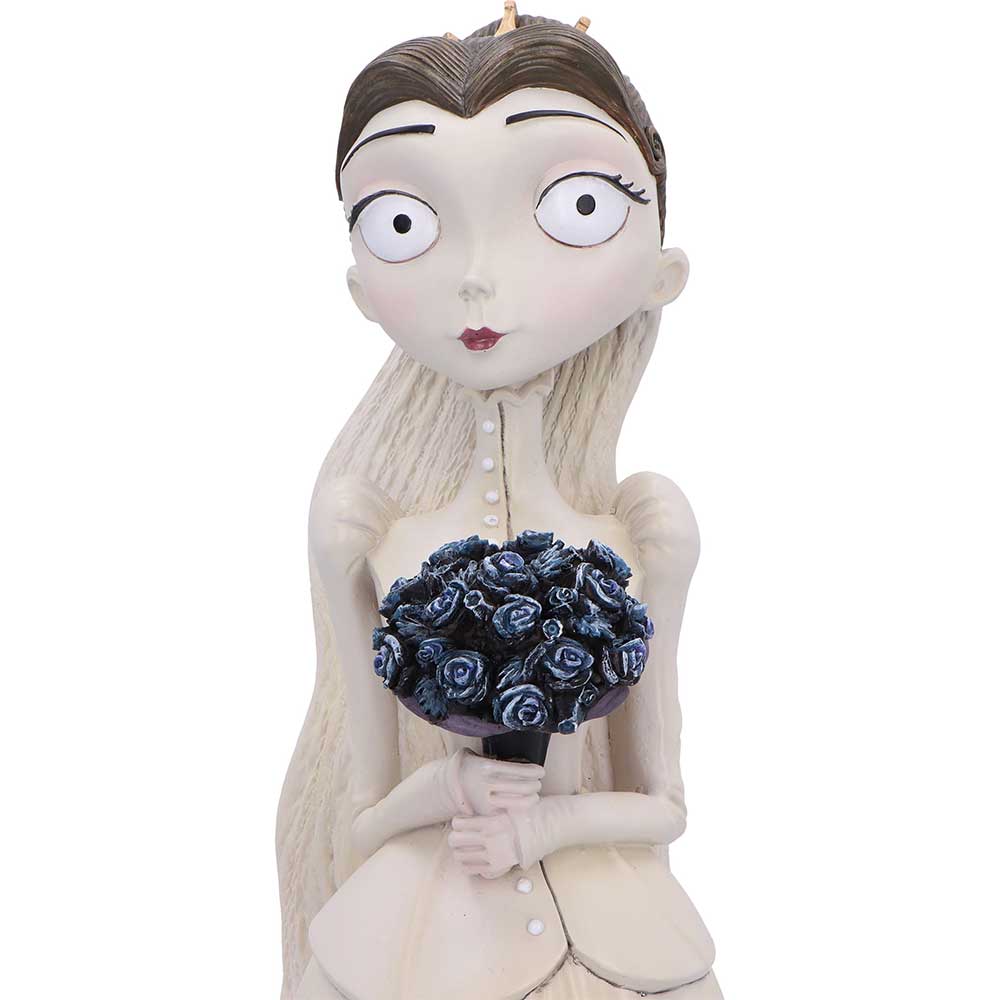Bride holding a bouquet of blue flowers
