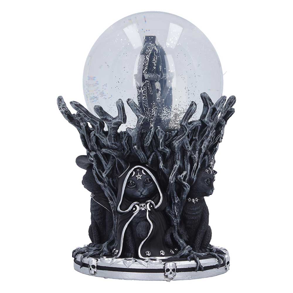 Decorative snow globe with black cat, skull, and tree branch design