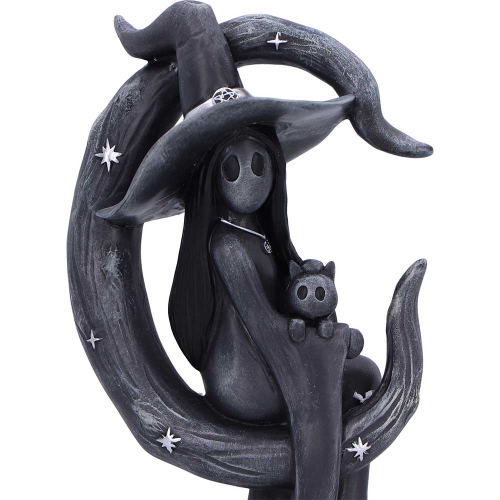 Close-up of Little Souls figurine showing cat and face detail