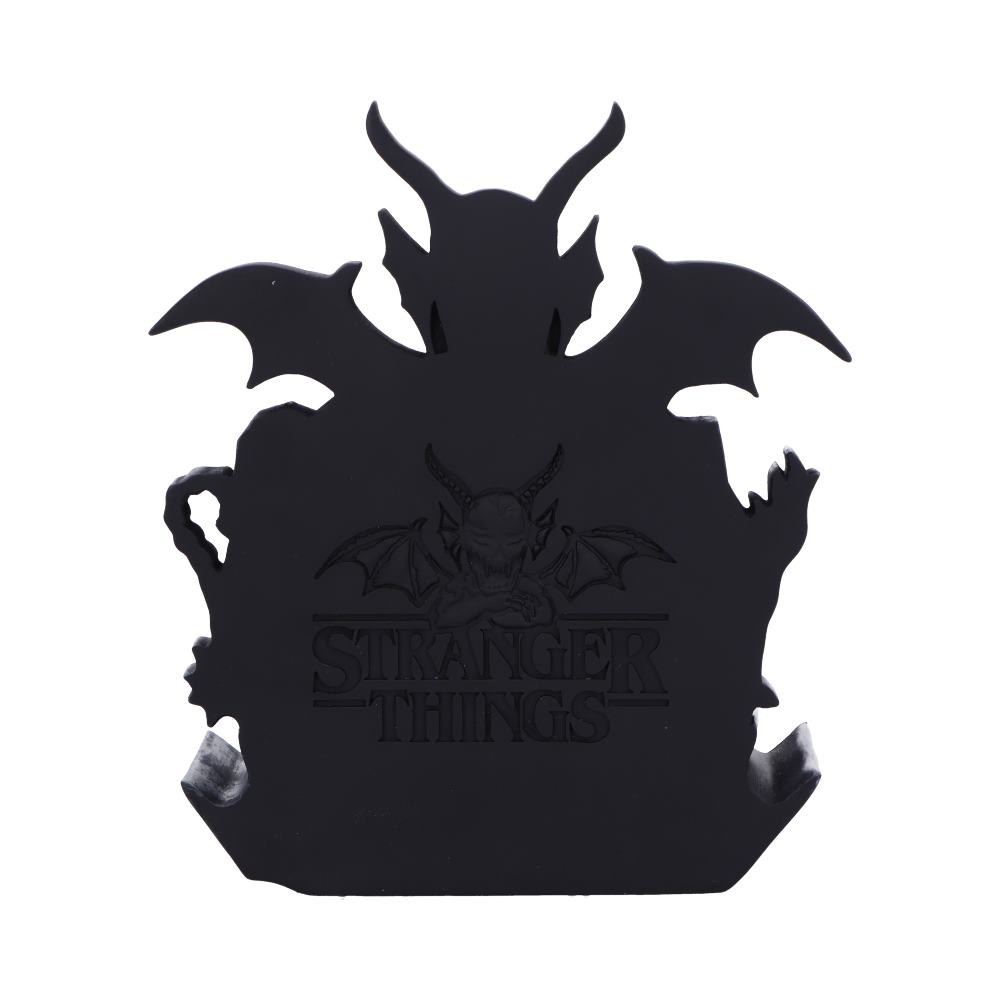 Black silhouette of a creature with 'Stranger Things' logo