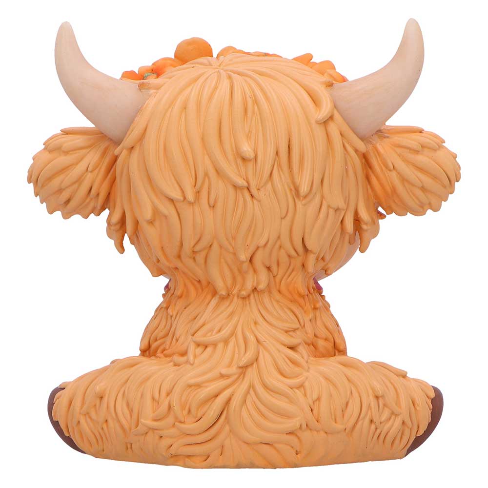 Figure of a highland cow with long hair and horns