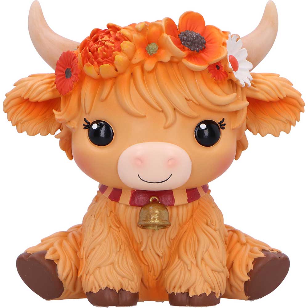 Cow with floral headband and bell on a white background