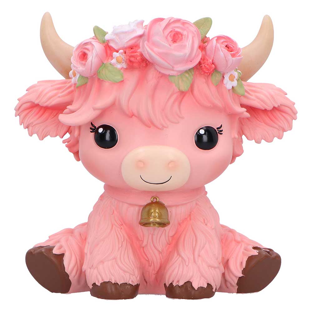 Pink cow figurine with flowers and bell