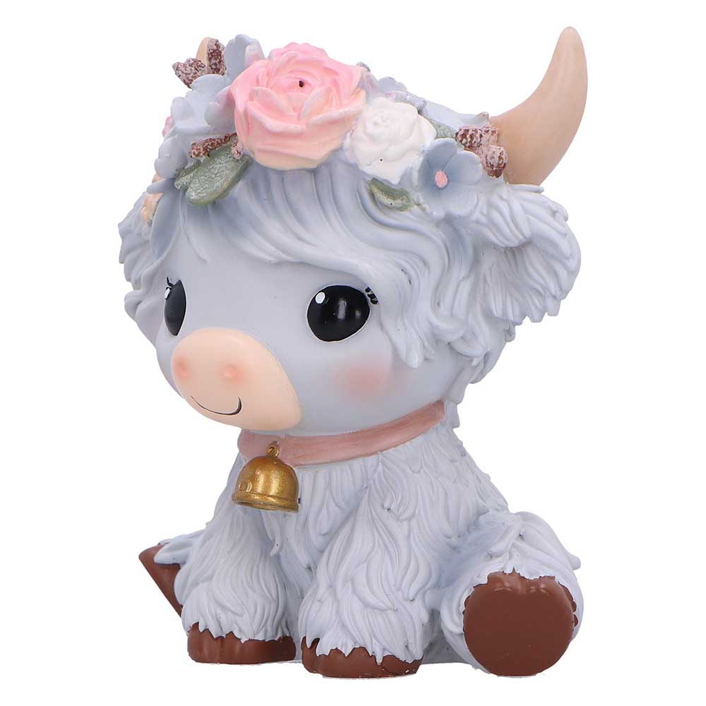 Grey cow figurine with flowers