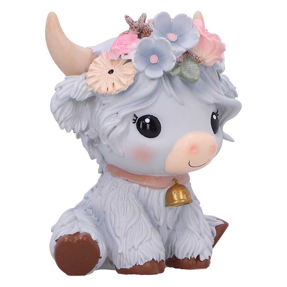 Cute cow figurine with floral headband and bell