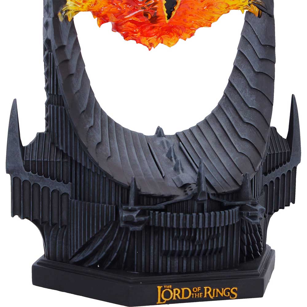 Close-up of the base of  Eye of Sauron lamp with 'The Lord of the Rings' logo.