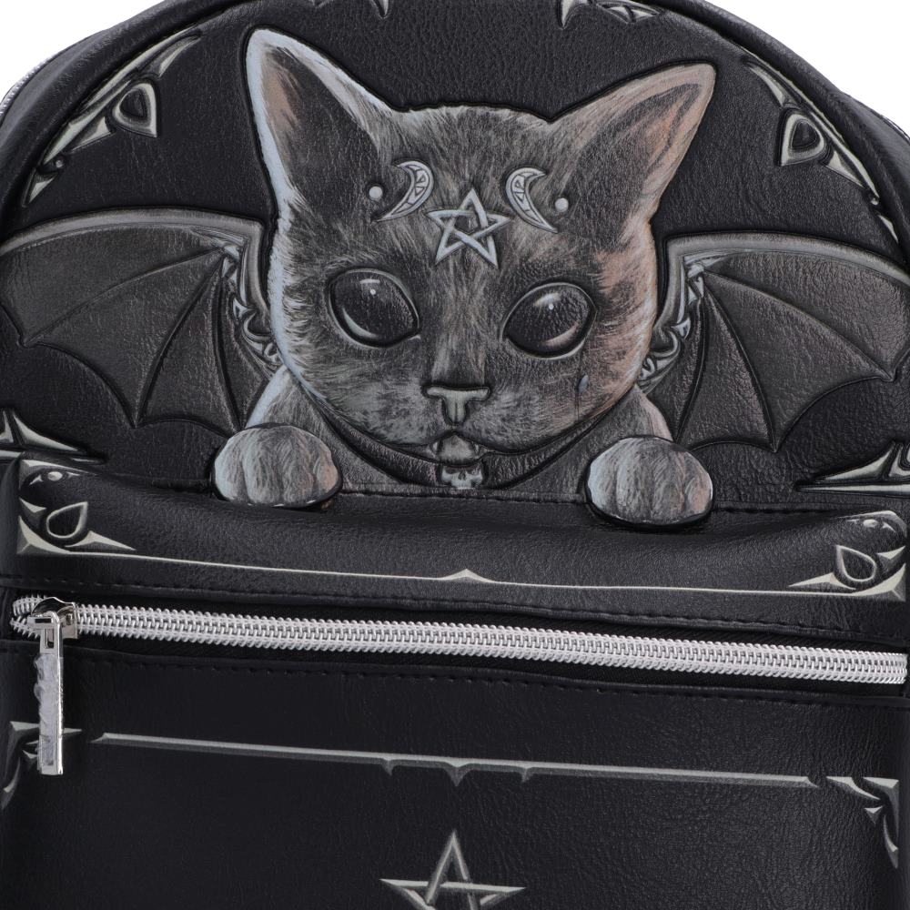 Close-up of Malpuss artwork on Nemesis Now gothic black faux-leather backpack featuring a detailed 3D bat-winged cat design with a pentagram on its forehead, a silver zipper, and gothic star details.