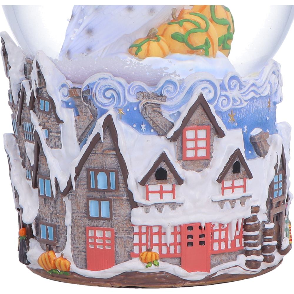 Detailed Harry Potter village houses on snow globe base