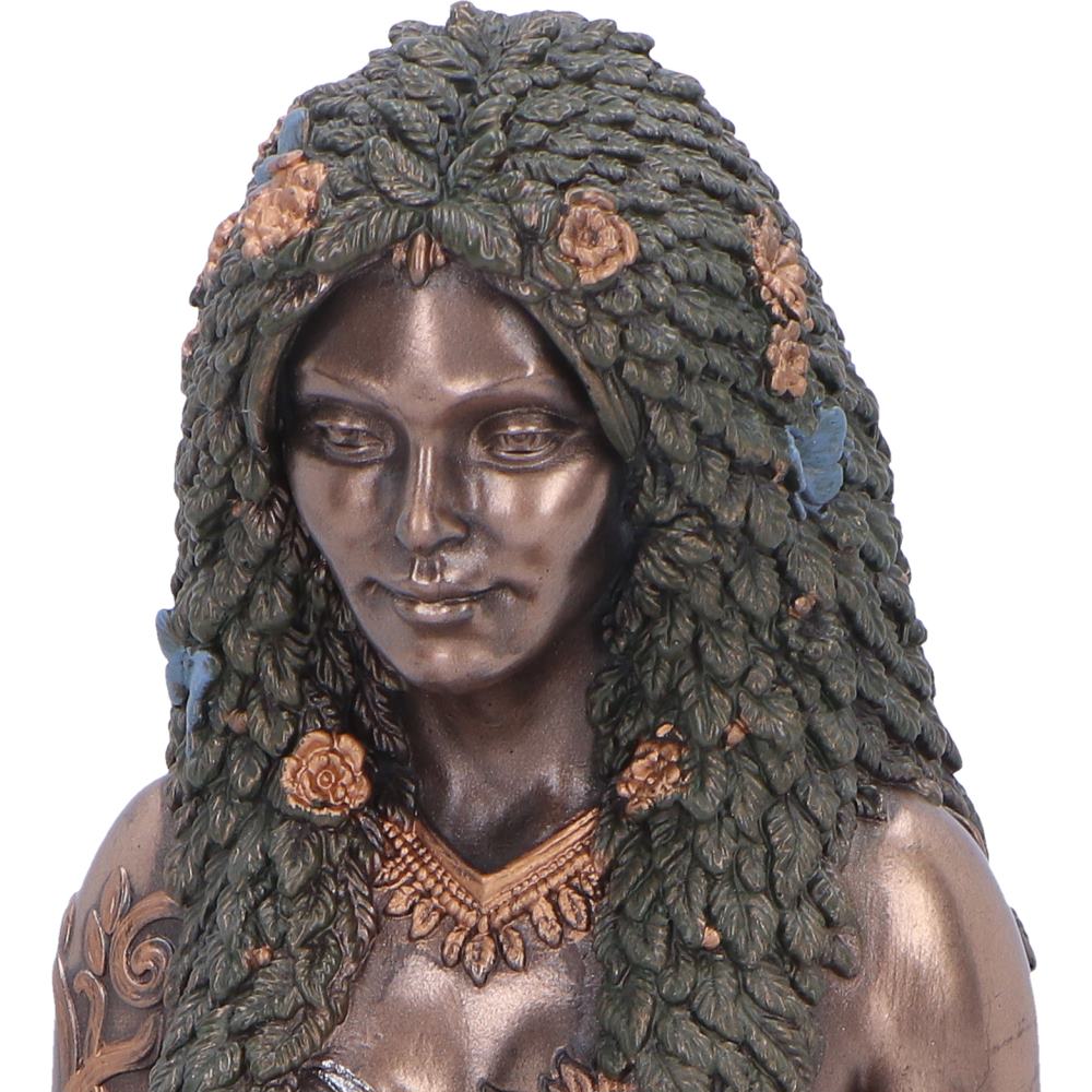 Close-up of foliage hair and bronze detailing