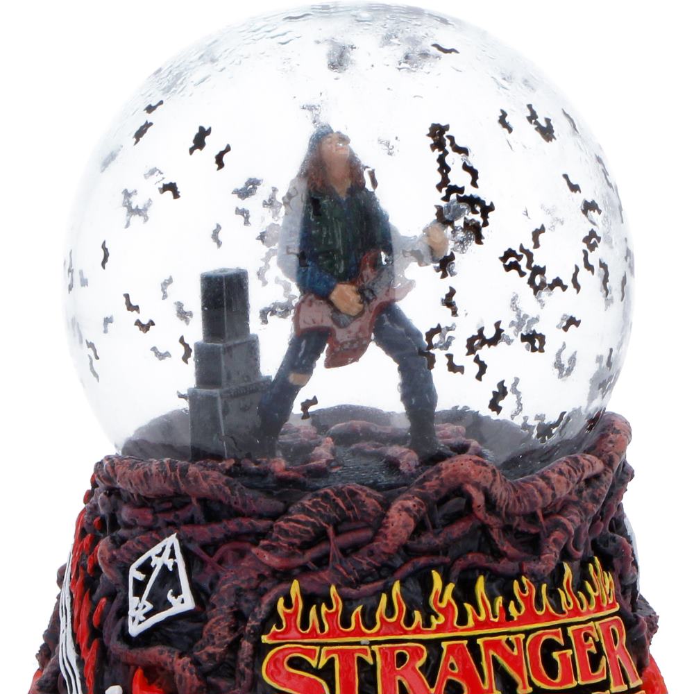 Close-up of Eddie Munson inside snow globe