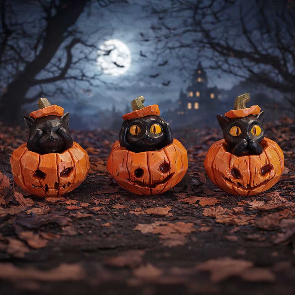 Three Wise Pumpkin Patch black cats and pumpkins in a spooky Halloween display