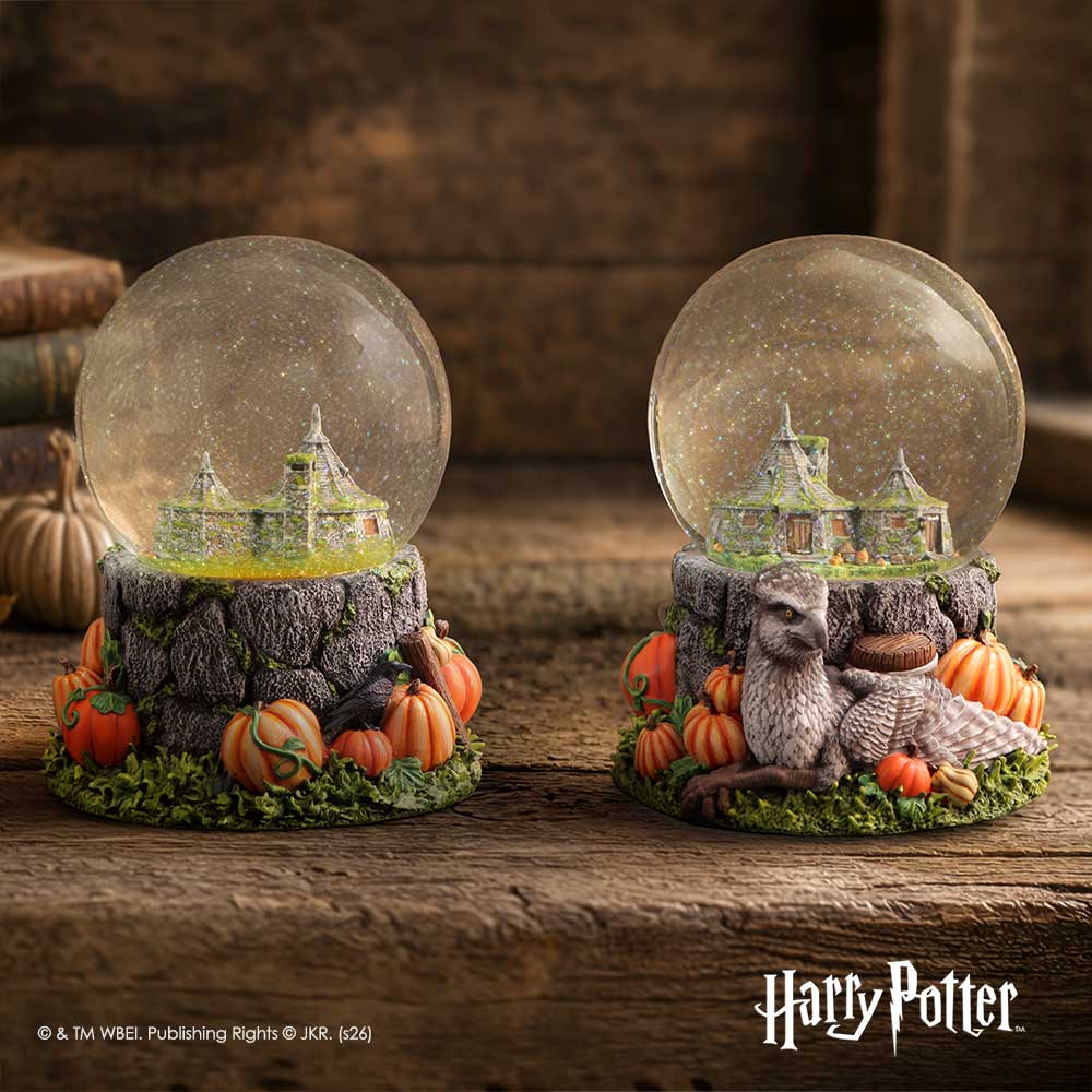 Hand-painted miniature Hagrid’s Hut inside the Harry Potter snow globe, Buckbeak resting at the front. Detailed pumpkins surrounding Hagrid’s Hut on the Harry Potter snow globe resin base