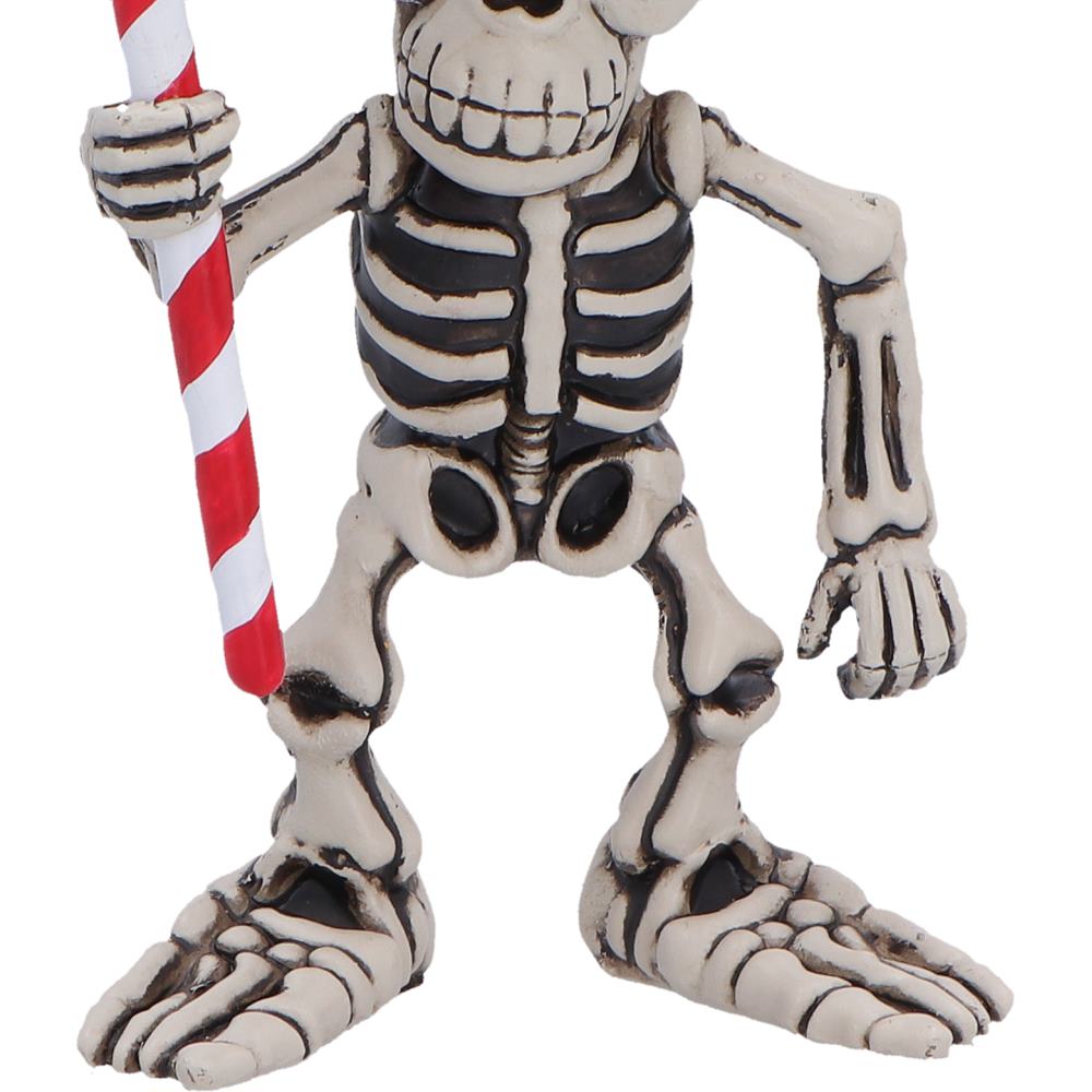 Close-up of the candy cane held by the Silent Nightmares Candyman Gothic Christmas figurine.