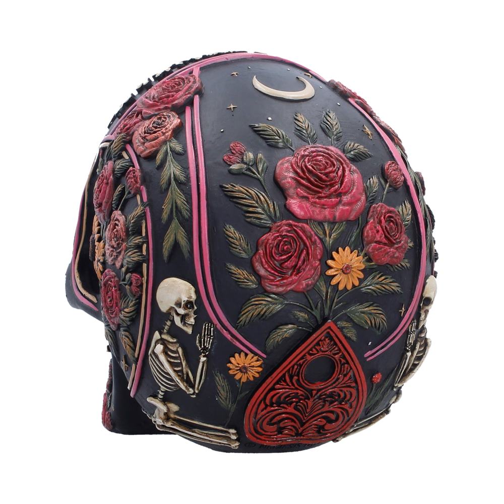 Detail view of the Spirit Board Bloom Skull featuring crescent moons and an all-seeing eye