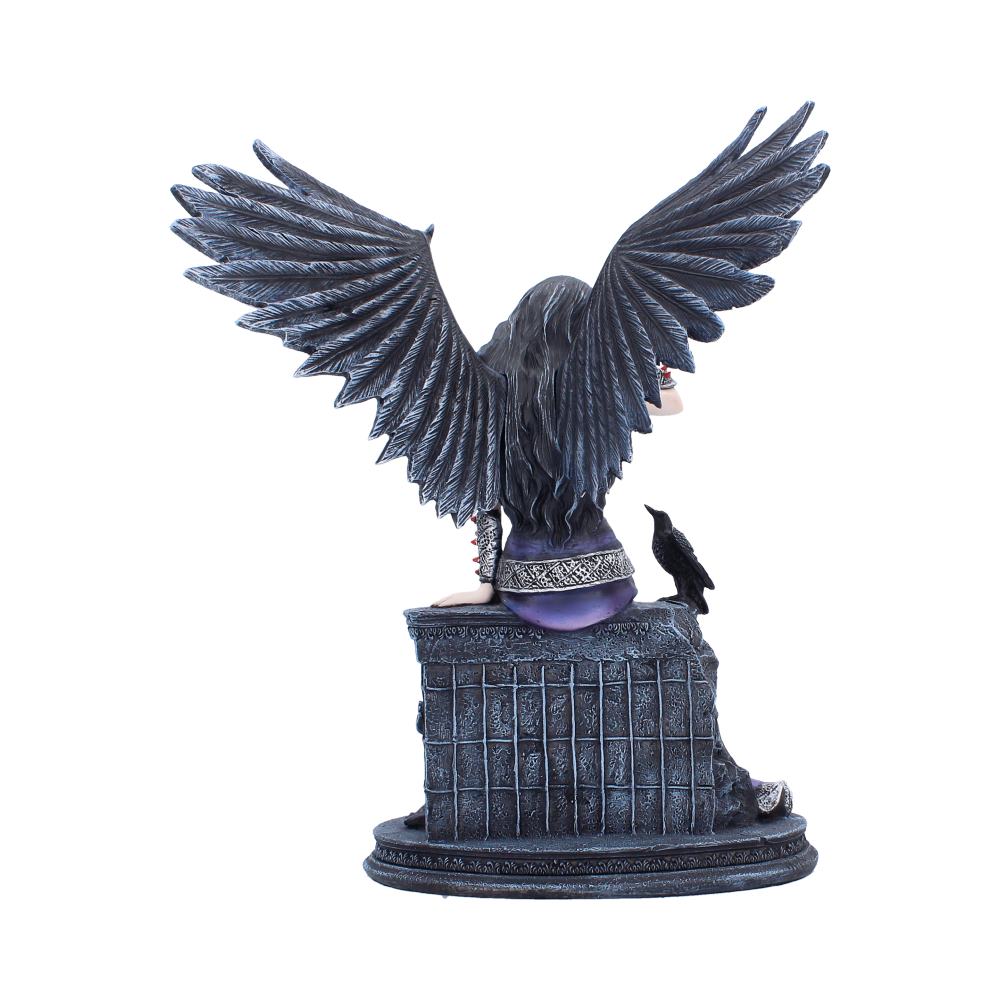 Back view of gothic fairy seated on stone bench with raven detail
