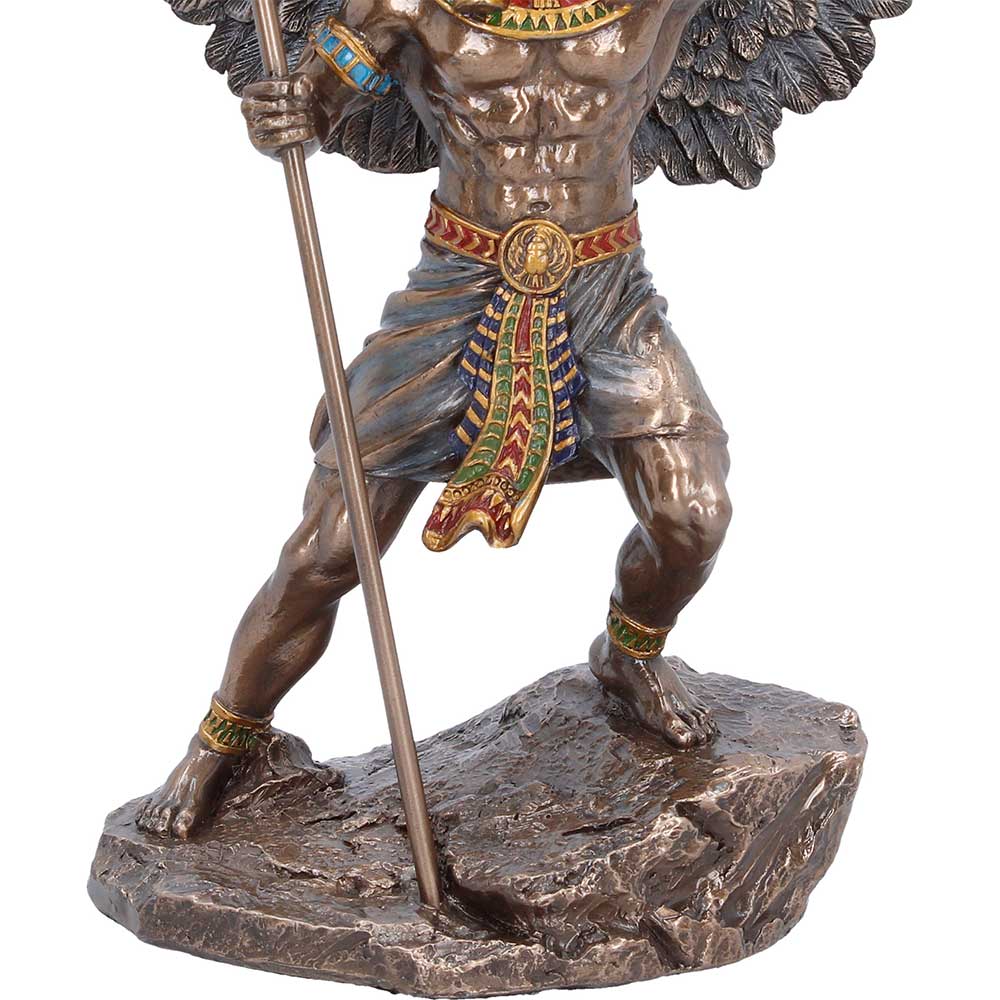 Egyptian god figurine with coloured accent detailing
