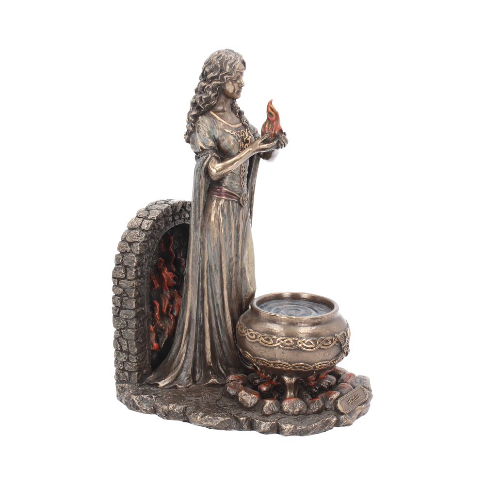 Bronze finish pagan figurine with triskelion symbol detail