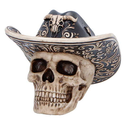 Wild West skull figurine wearing a cowboy hat