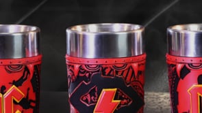 AC/DC Logo Shot Glass Set video showcasing the iconic AC/DC logo, lightning bolt design, removable stainless steel inserts, and hand-painted resin detailing.