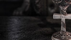 360° view of the Ozzy Osbourne Prince of Darkness Goblet 19.5cm showcasing its Gothic pattern, silver cross handle, Ozzy engraving, bat detail and stainless steel insert.