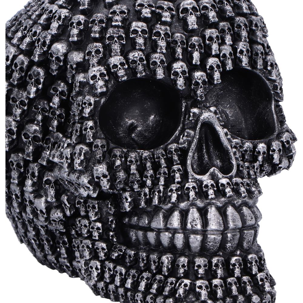 Close-up of the Crania multi-skull ornamental design with intricate detailing