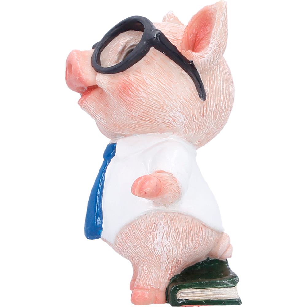 Pig ornament side view showing outfit and pose