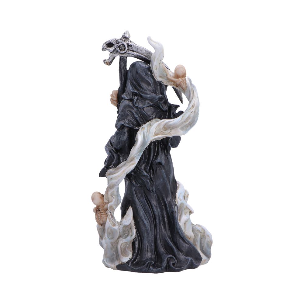 Statue of a figure in dark robes with a staff