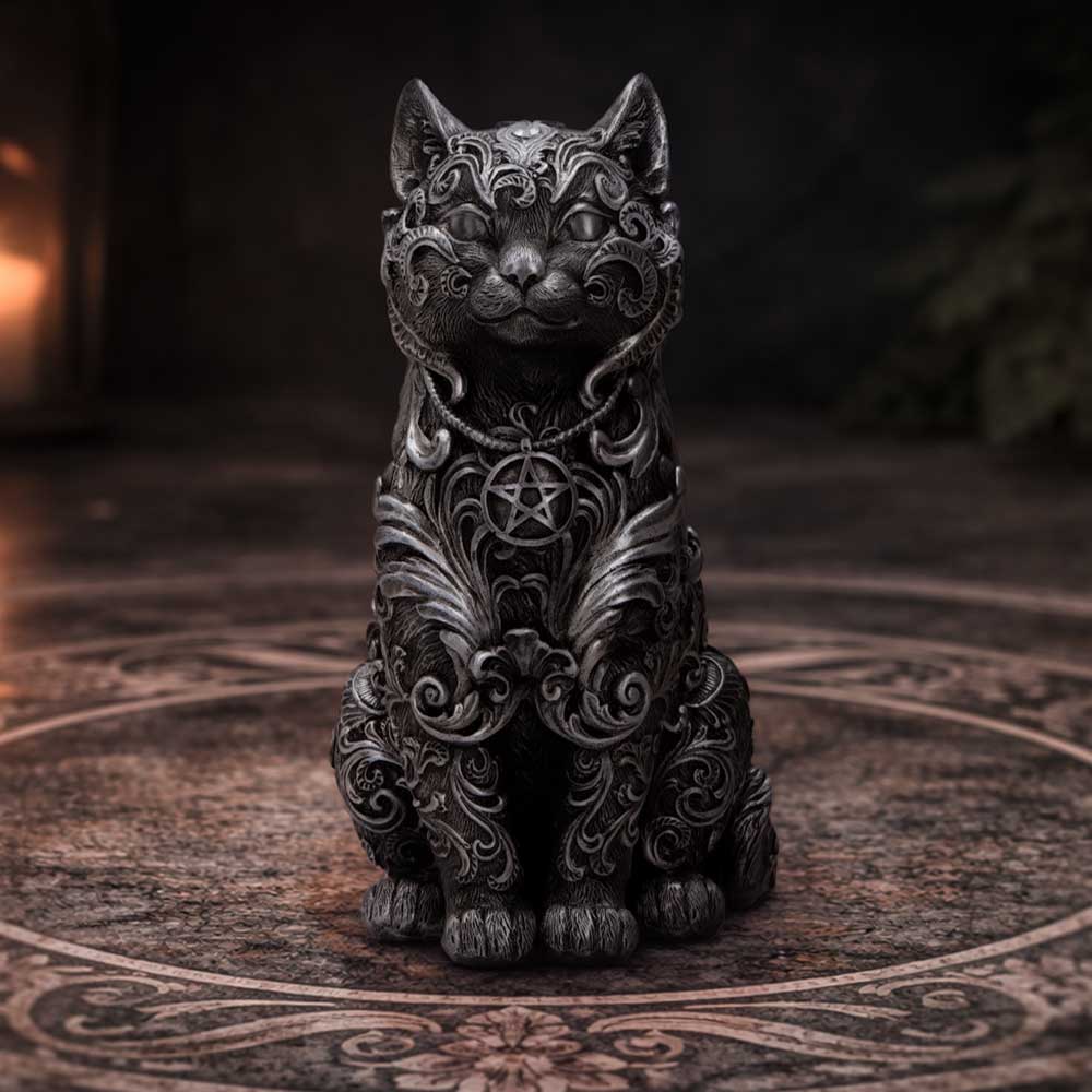Mystical silver cat ornament displayed as gothic decor