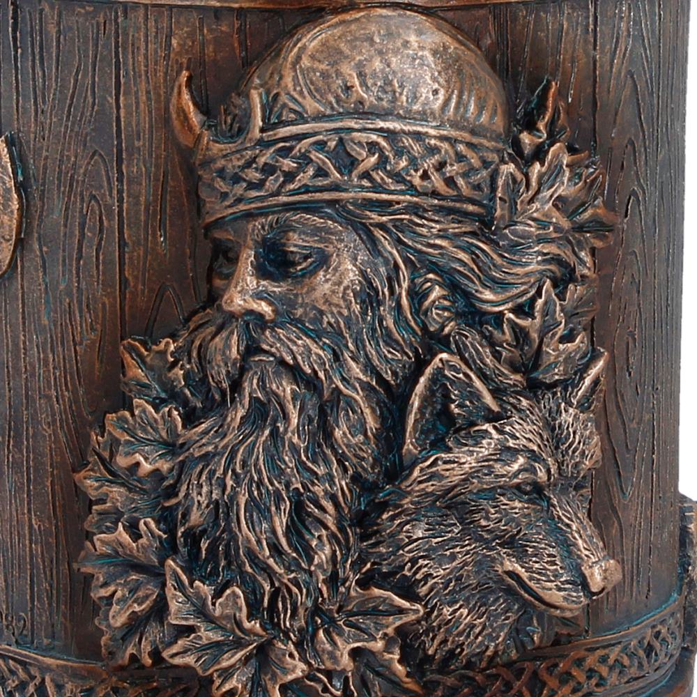 Close-up of Viking portrait on tankard detail