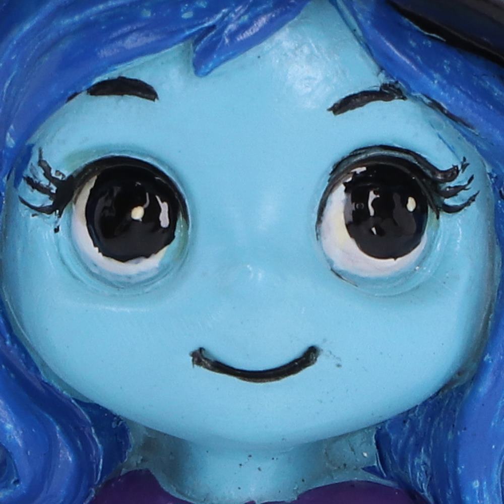 Close-up of Spirit Fairy Hex blue face with cute smiling expression with large black eyes, black eyebrows and bright blue hair.