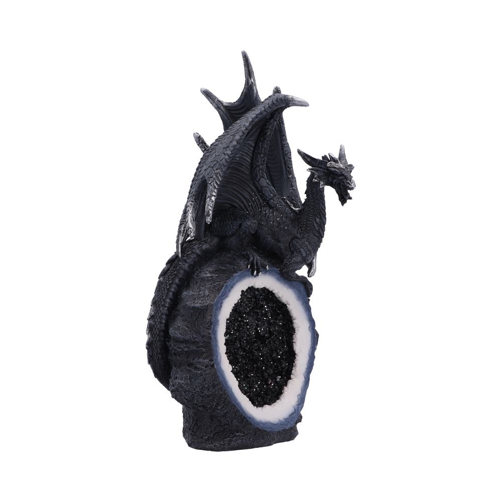  Midnight Crystal Overseer a black dragon figurine perched atop a geode-like rock formation with a white and black crystalline interior